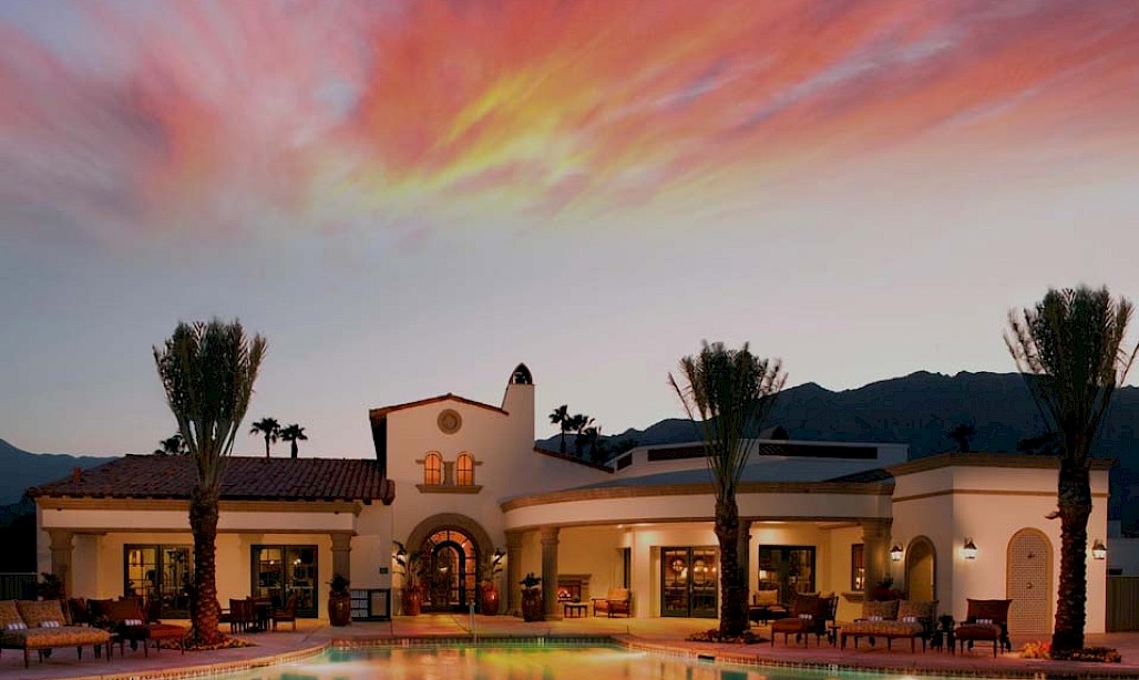 PGA West clubhouse pool at sunset